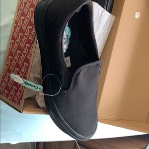 Brand new in box vans!! All black slip ons.
